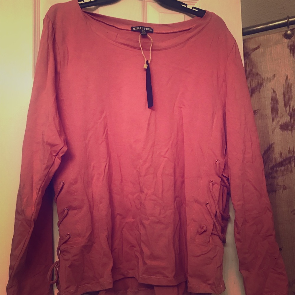 Pink shirt with lace up sides. NWT.